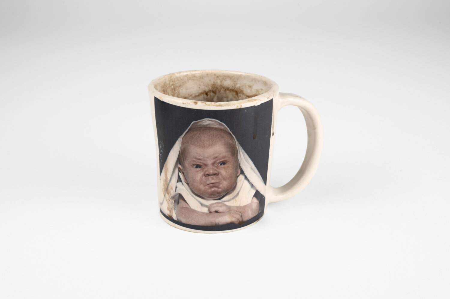Erica Eyres | Mug: Coffee (angry baby) | 2022 | glazed stoneware | SOLD