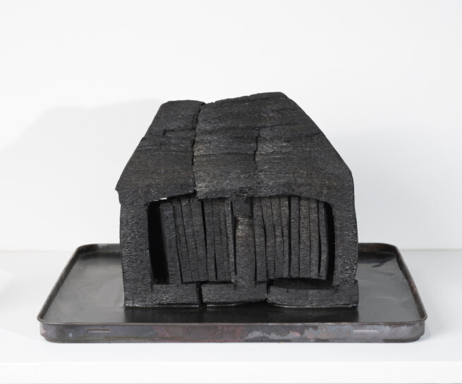 Library #1 | 2023 | carbon wood, wax + tin | 9 x 1.75 x 6.25 in.